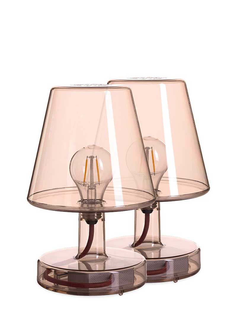 Set of 2 Fatboy Transloetje table lamps in transparent brown color, featuring wireless, touch-controlled LED lighting with 3 brightness settings for modern Canadian interiors.