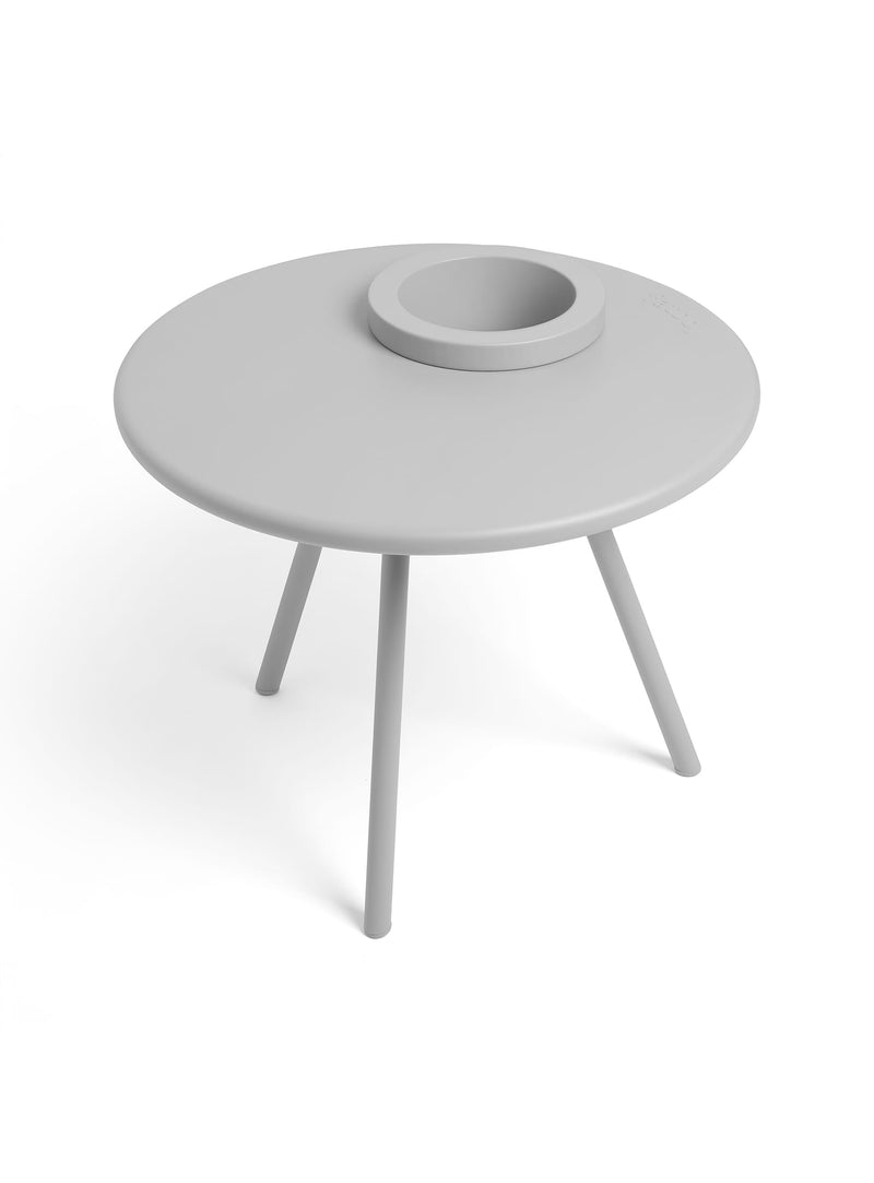 Fatboy Bakkes end table in light grey with a built-in planter and tripod design, ideal for modern interiors and outdoor spaces.