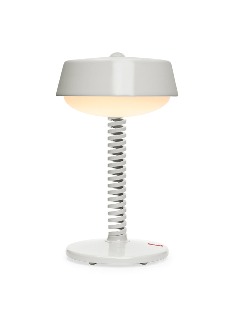 Fatboy Bellboy table lamp in desert, cordless and dimmable with rechargeable LED light, perfect for indoor and outdoor use.