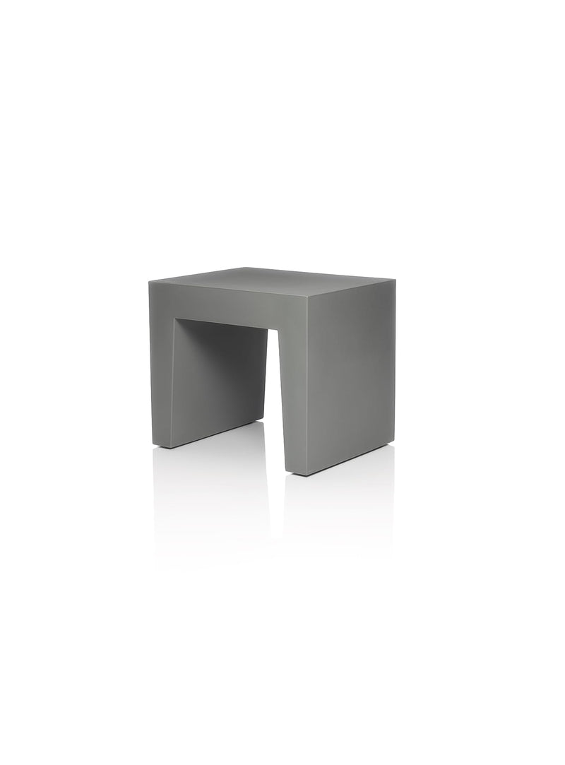 Fatboy Concrete Seat in grey color, versatile indoor and outdoor seating or side table, durable plastic with fillable base for stability in Canadian spaces.