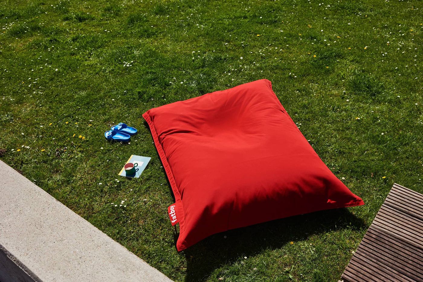 Fatboy Slim Olefin: UV, water, and dirt-resistant outdoor bean bag with vibrant, long-lasting color, easy to clean for worry-free relaxation. Slimmer than the Original.