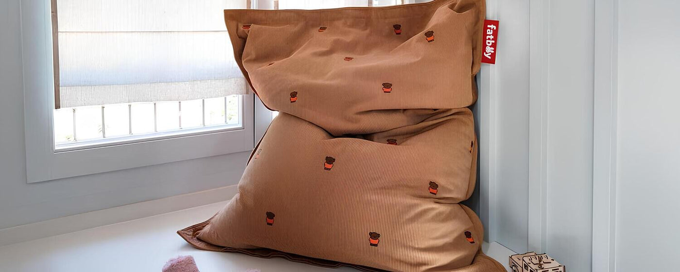 Fatboy x Miffy collection featuring colorful bean bags, poufs, lamps, bags, and play mats with Miffy and Boris character designs.