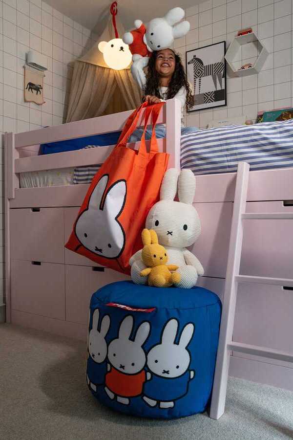 Fatboy x Miffy collection featuring colorful bean bags, poufs, lamps, bags, and play mats with Miffy and Boris character designs.