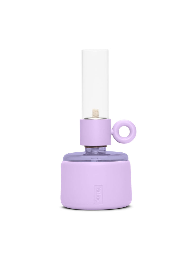 Fatboy Flamtastique XS in lilac color, modern oil lamp with dimmable light and silicone finish, perfect for indoor and outdoor ambiance.