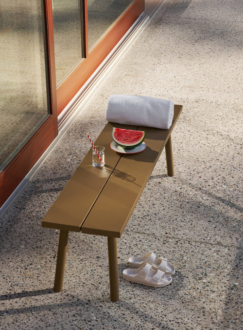 Fred’s Bench is a modern outdoor bench inspired by the picnic classic, offering clean lines and comfortable seating for three.