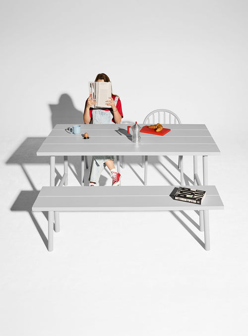 Fred’s Medium Table is a modern picnic-style outdoor table that comfortably seats four to six and fits beautifully into patios and outdoor spaces.