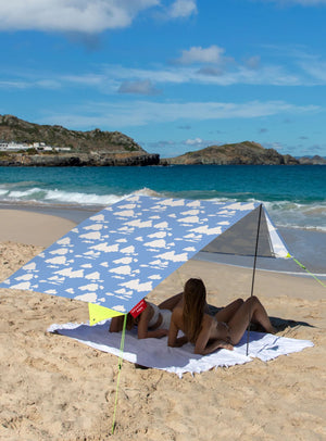 Portable Miasun x Dusen Dusen sunshade with blue sky and white cloud pattern, ideal for outdoor adventures.