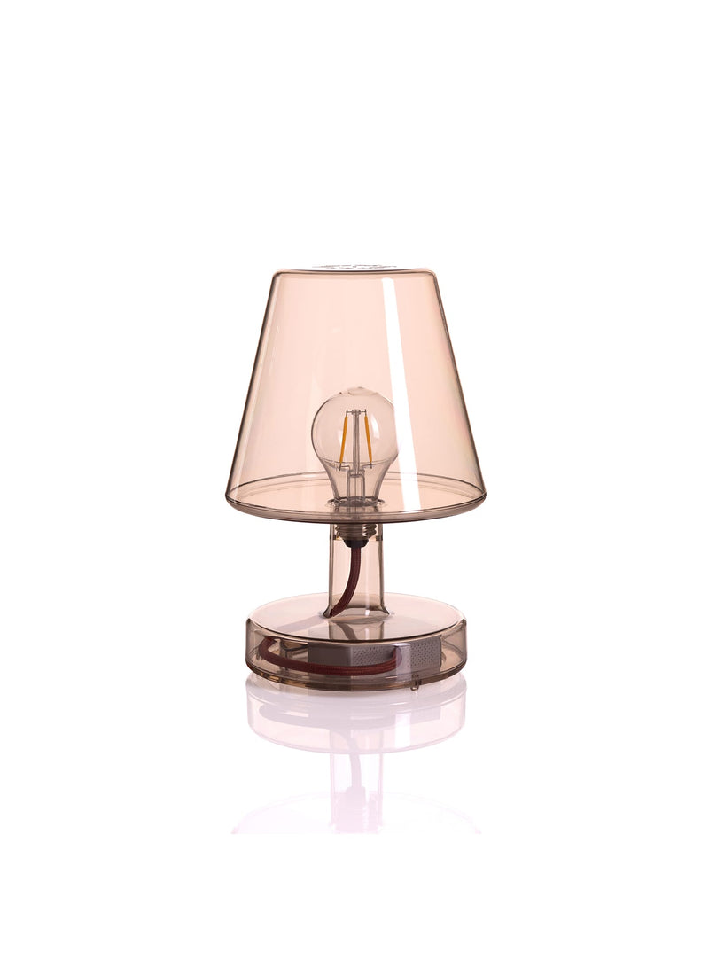 Fatboy Transloetje table lamp in brown transparent color, featuring a wireless, touch-controlled LED light with 3 brightness settings for modern Canadian interiors.