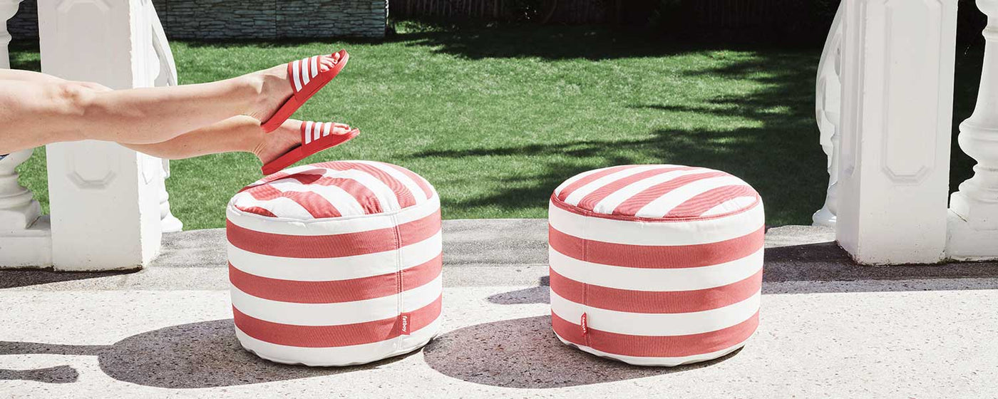 Pretty and practical, this small round outdoor pouf is the dot on the i for everyone's outdoor spaces.